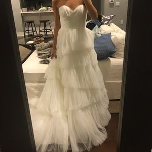 BRAND NEW WEDDING DRESS. Never been worn!